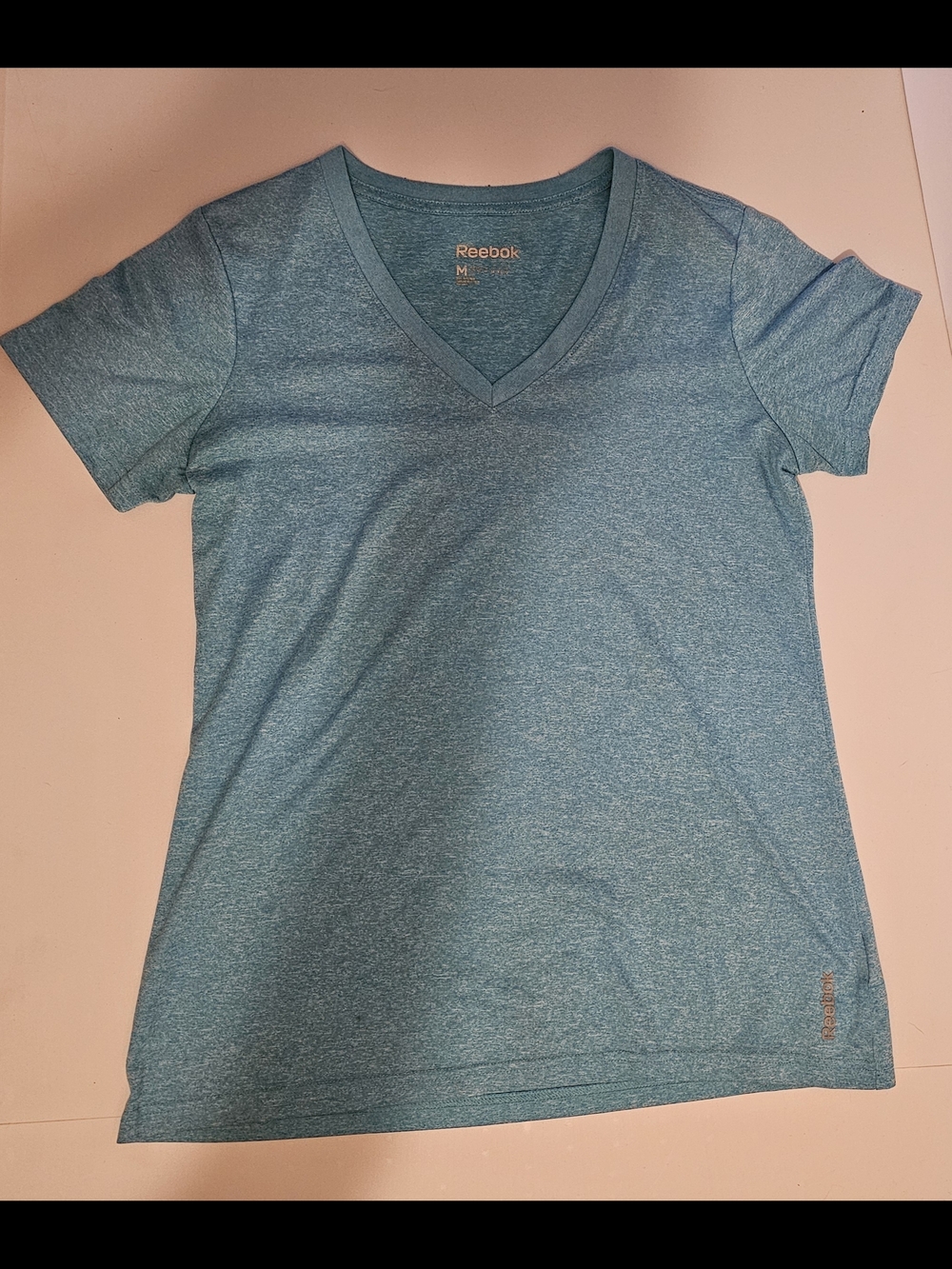 Reebok Women’s Heather Light Blue V-Neck Short Sleeve Tee